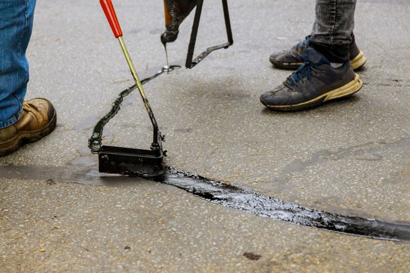 Asphalt Sealcoating Process